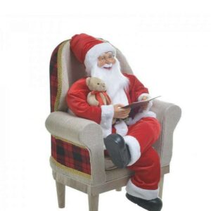Babbo Natale sulla Poltrona con Quaderno e Orsacchiotto